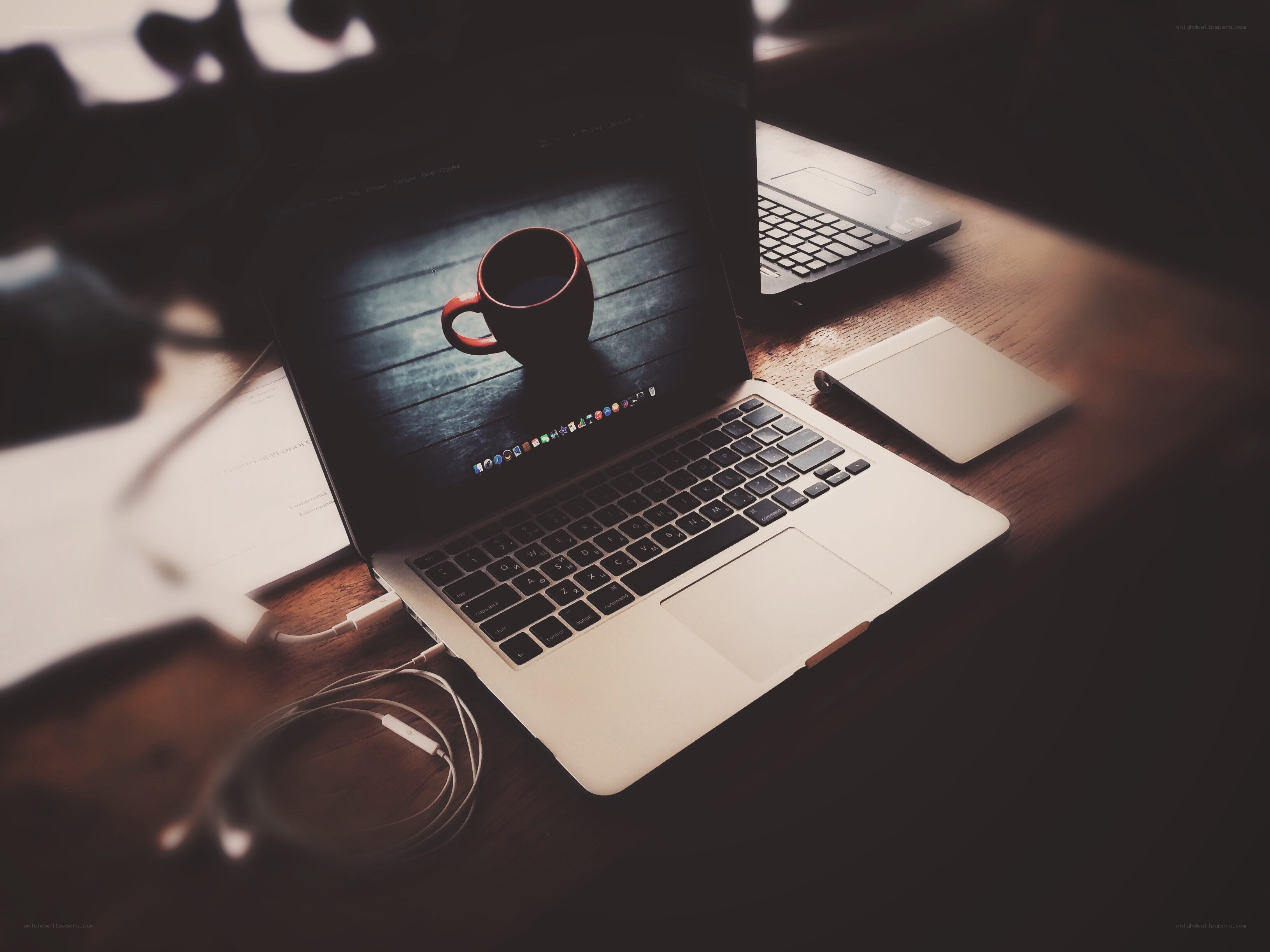 laptop on wooden desk