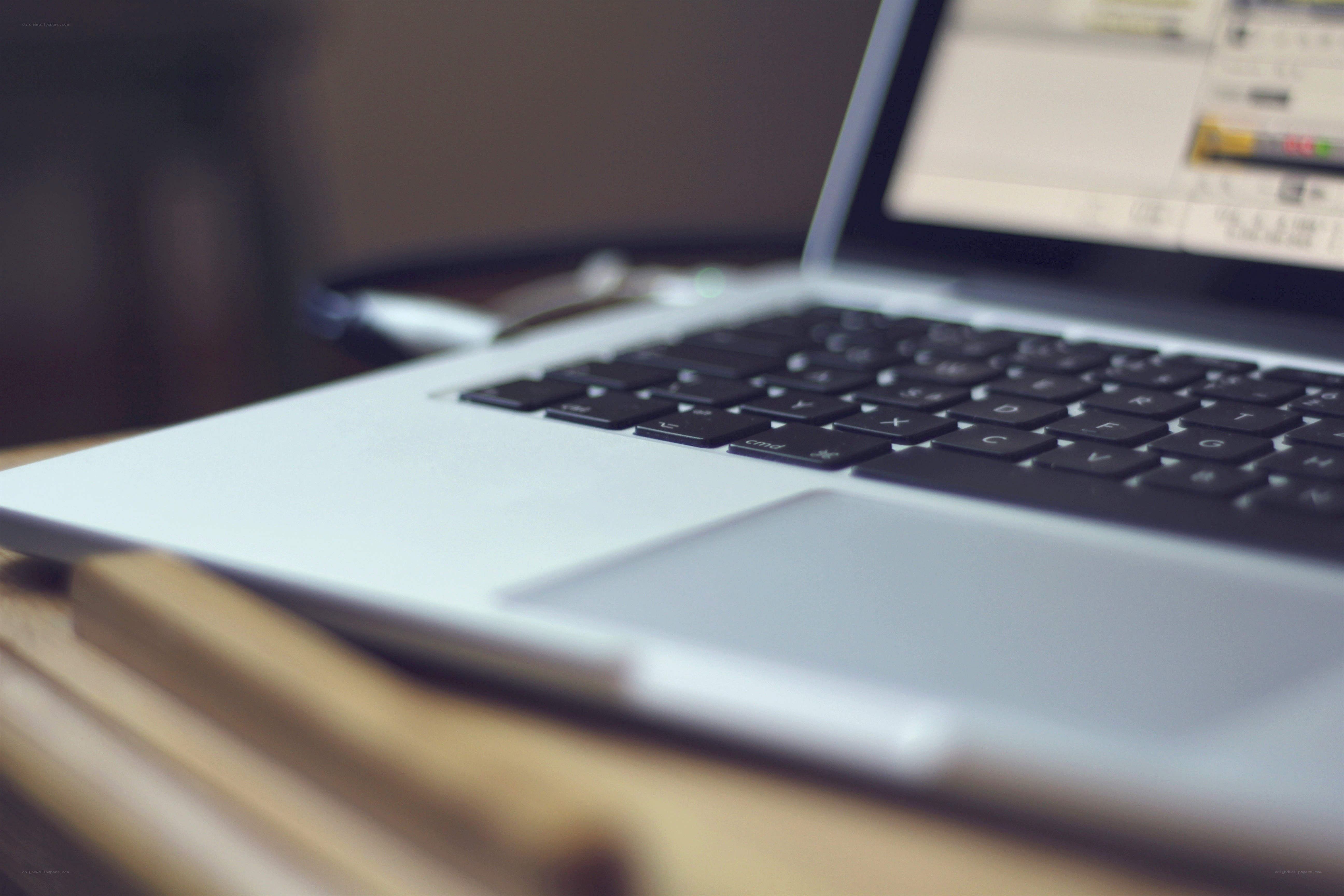laptop on wooden surface
