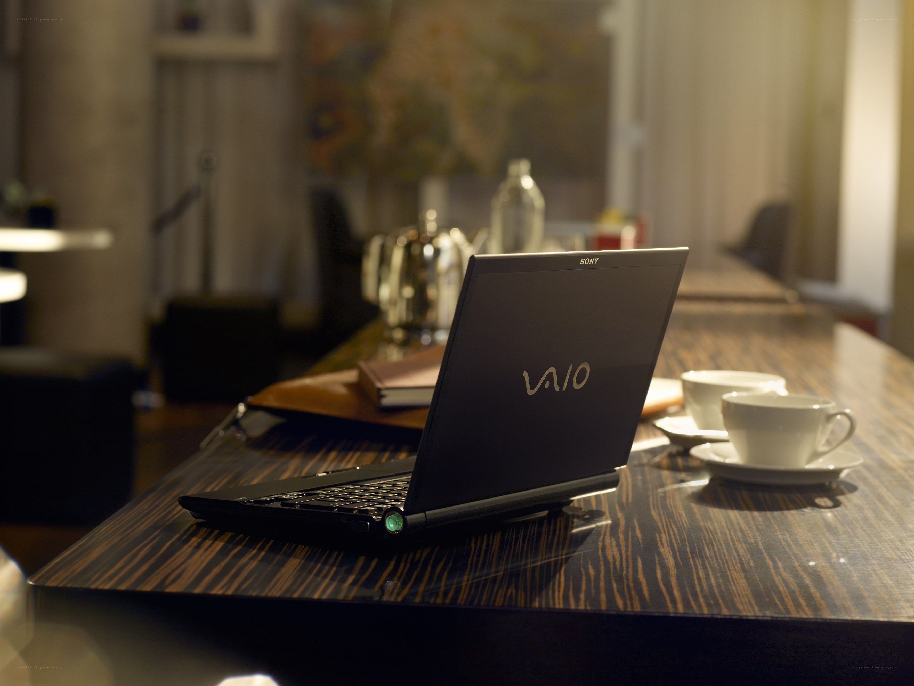 Laptop on wooden table