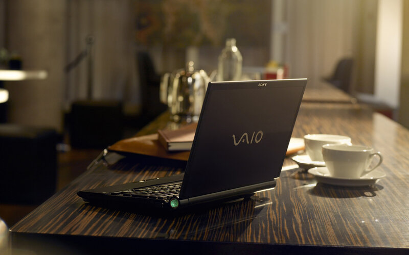 Laptop on Wooden Table — Brown