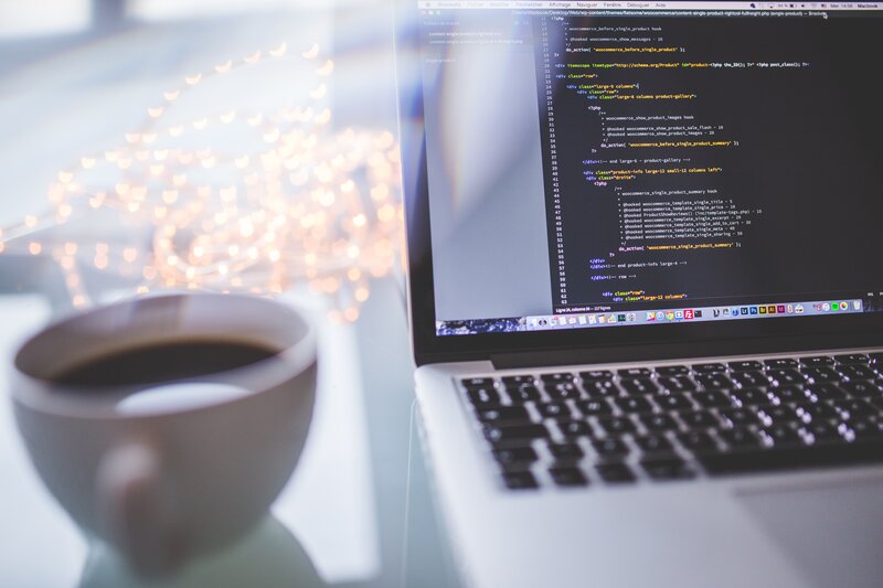 Laptop with Code and Coffee