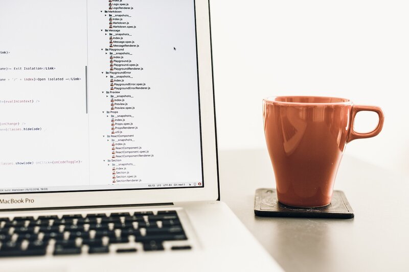 Laptop with Code Editor