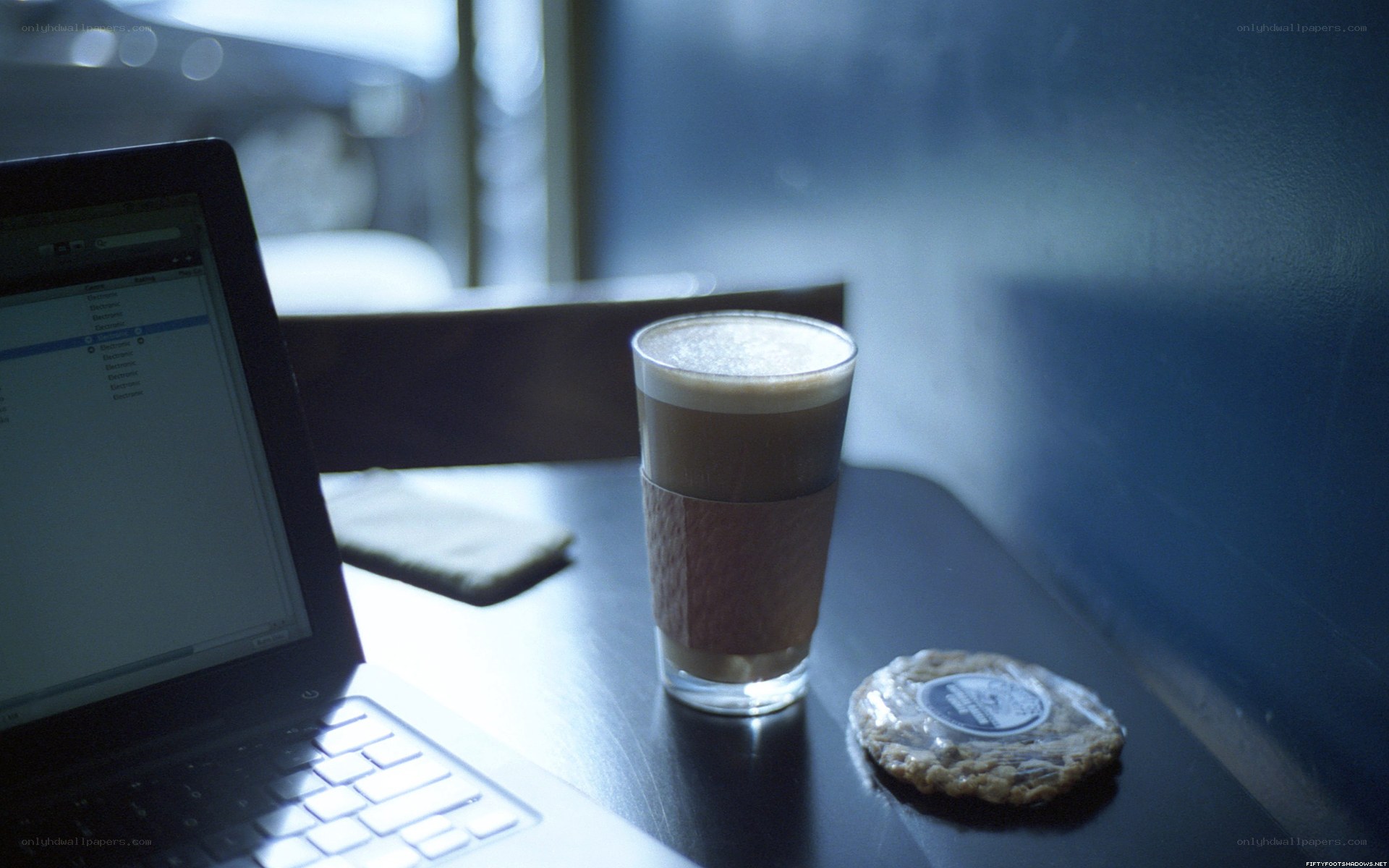laptop with coffee and cookie