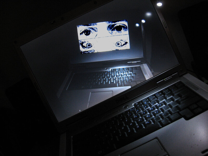 laptop with eyes image