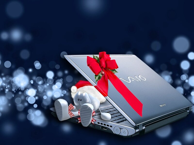 laptop with holiday gift