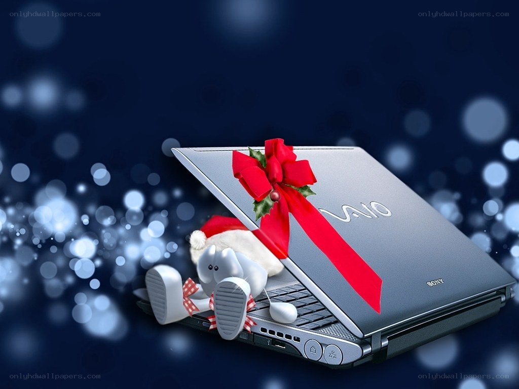 laptop with holiday gift