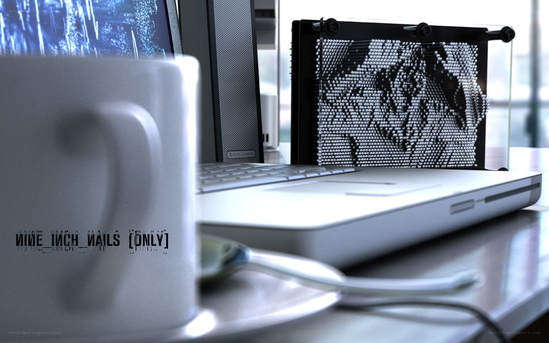 laptop with push pin art