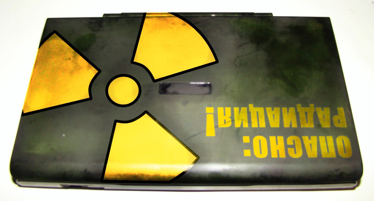 laptop with radiation symbol