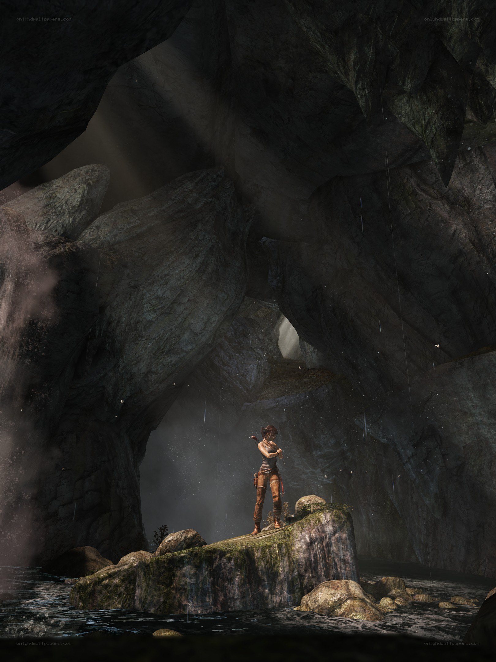 Lara Croft in a dark cave