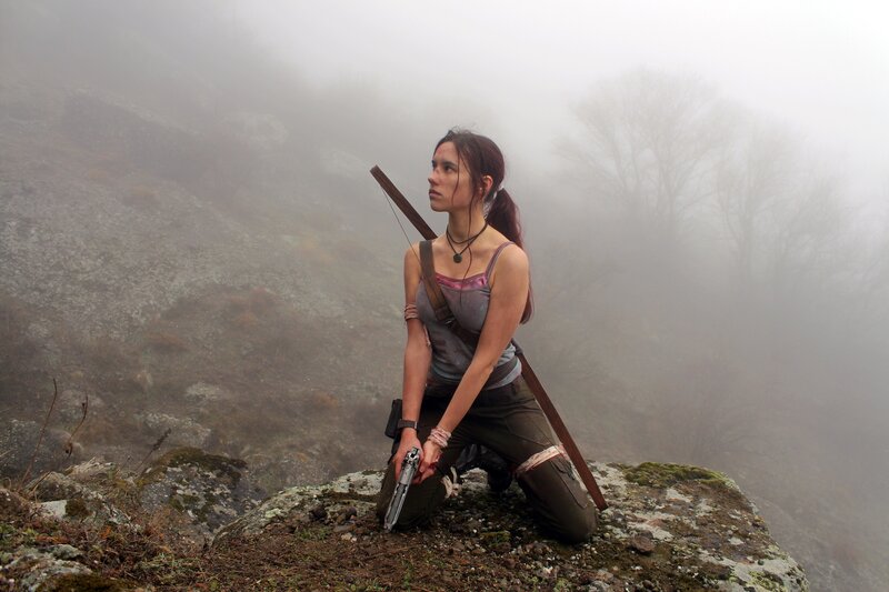 Lara Croft in foggy mountains