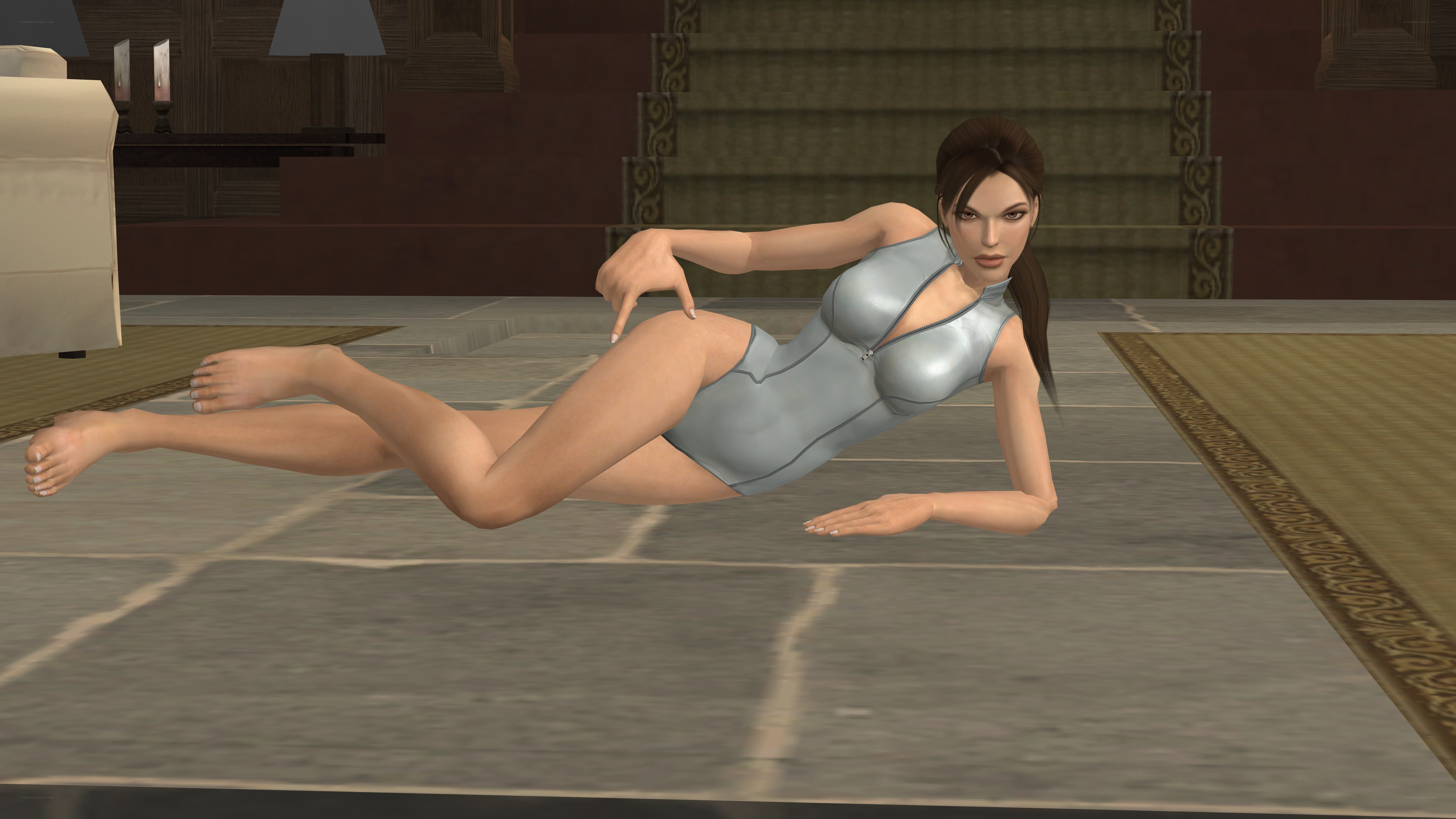 Lara Croft in silver bodysuit