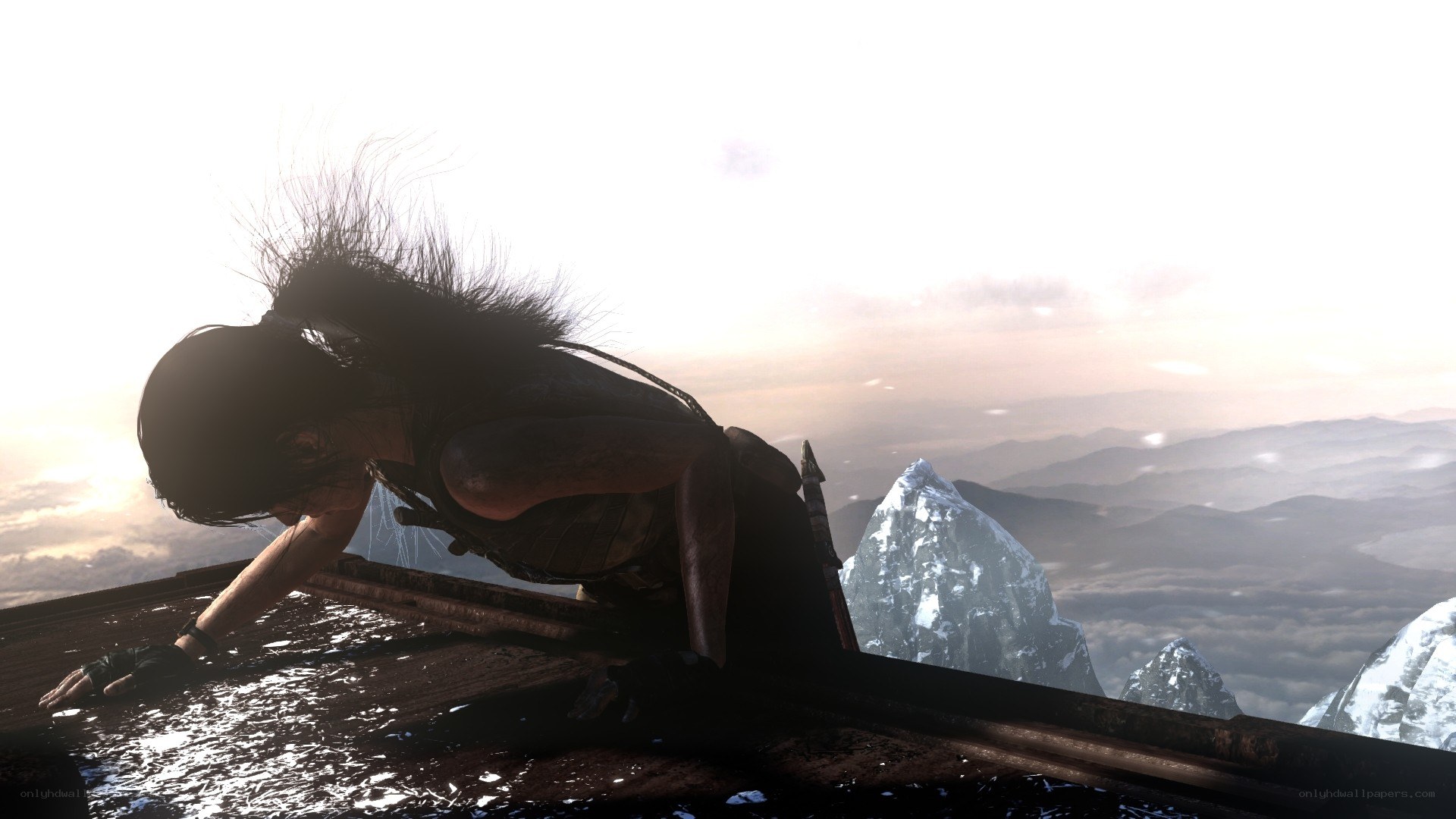 Lara Croft on a mountain ledge