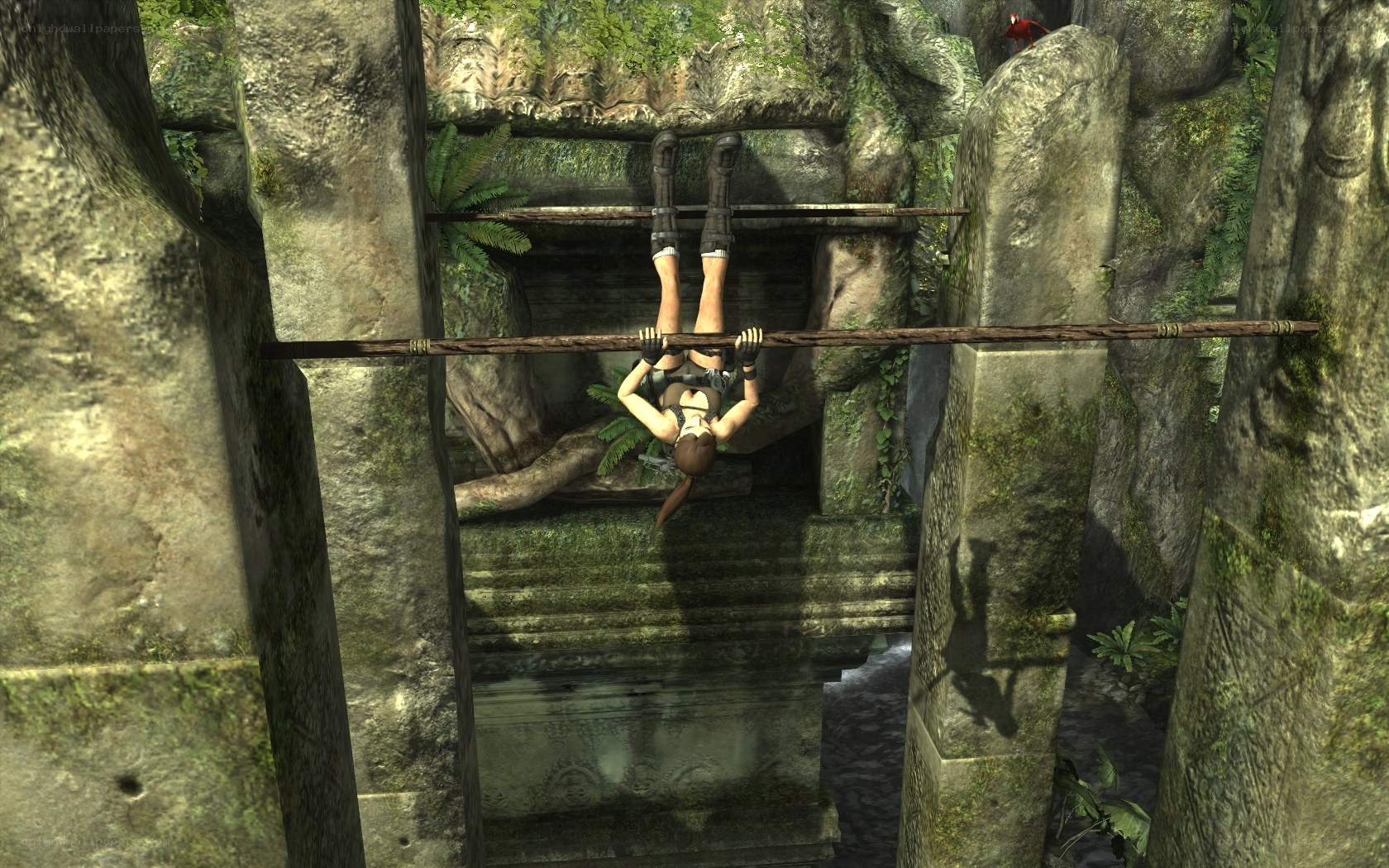 Lara Croft swinging on a pole