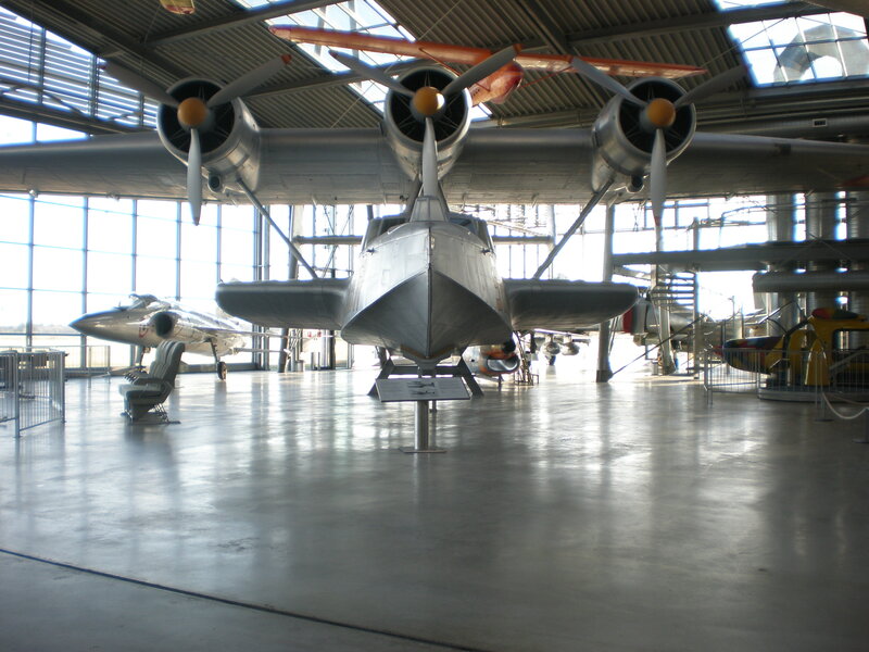 Large aircraft in museum hangar