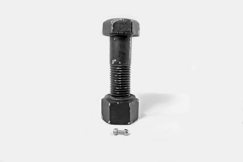 large bolt with small screw