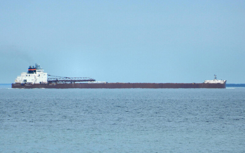 Large Cargo Ship — Blue, Calm, Afternoon, Photograph