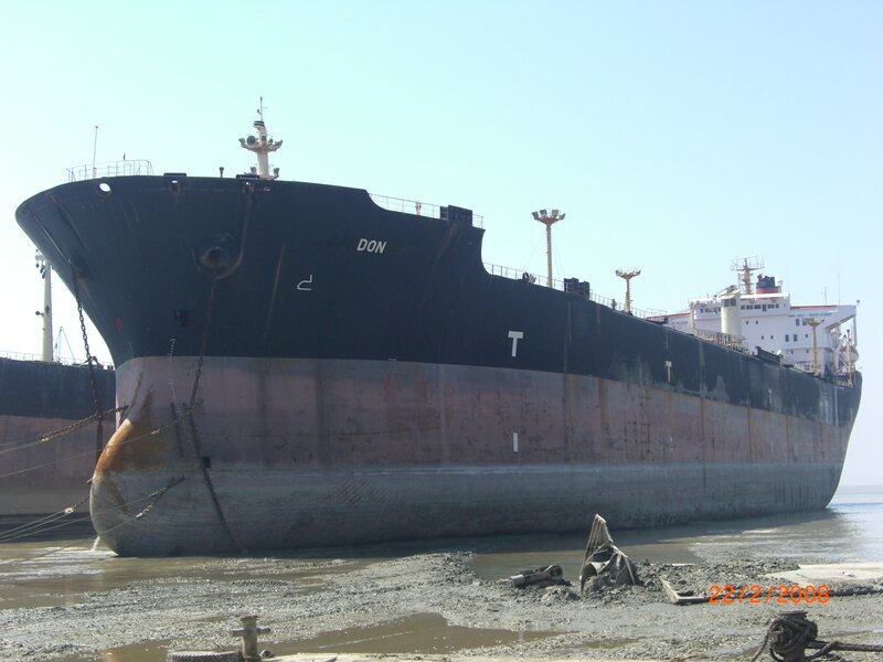 Large cargo ship docked at port