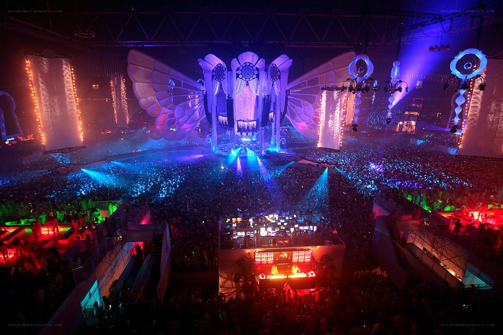 Large concert crowd with stage
