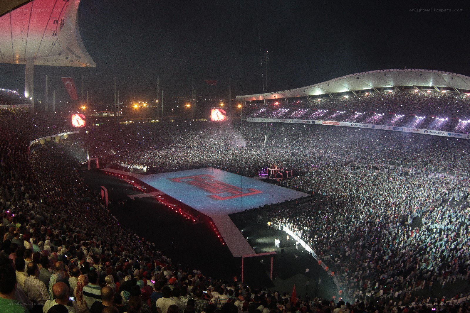 Large concert in stadium at night