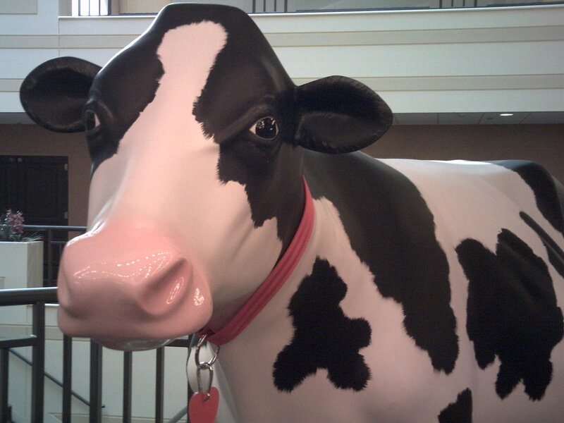 large cow statue in building