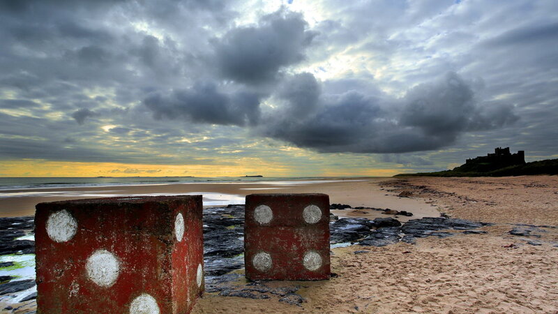 Large Dice on Beach