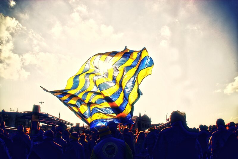Large Flag in Crowd