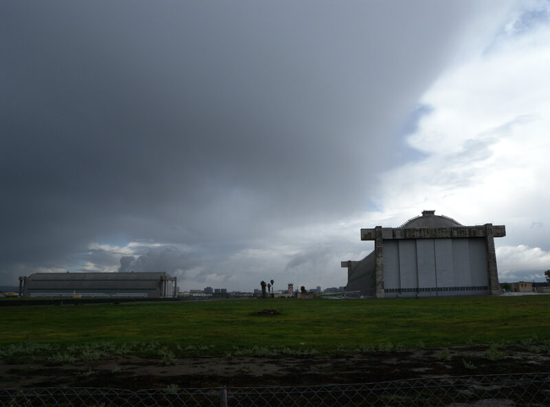 Large hangars under stormy sky