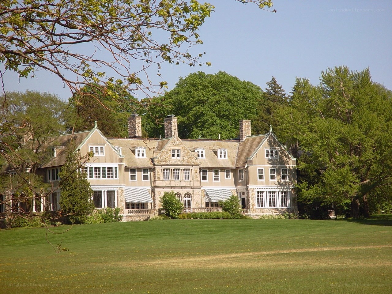 Large house on a green lawn