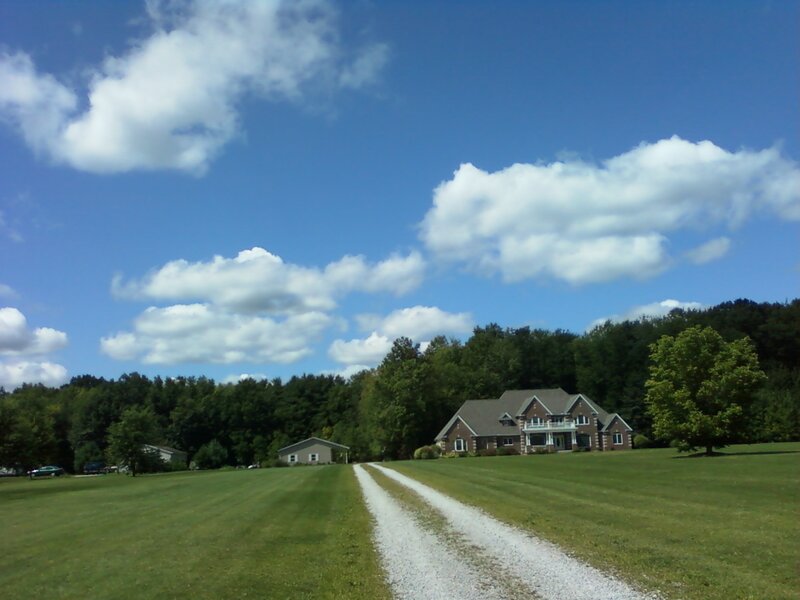 Large House on Grassy Field