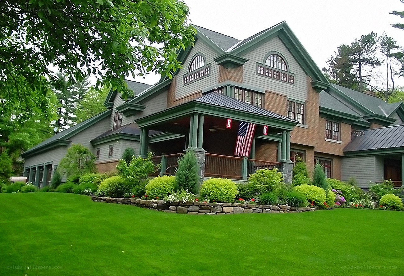 large house with green lawn