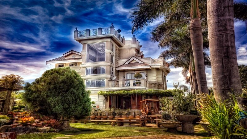 Large House with Palm Trees
