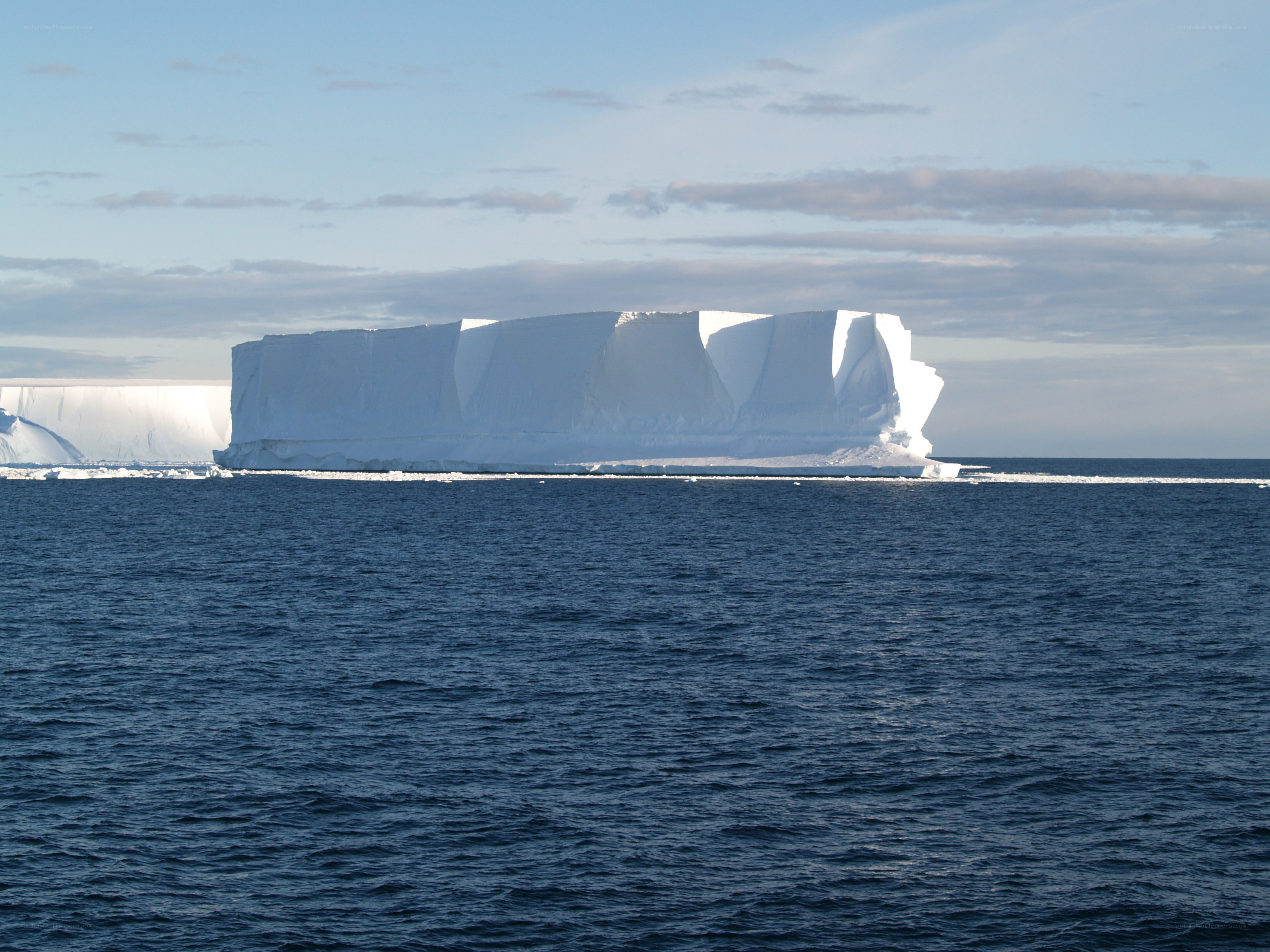 Large iceberg floating in ocean