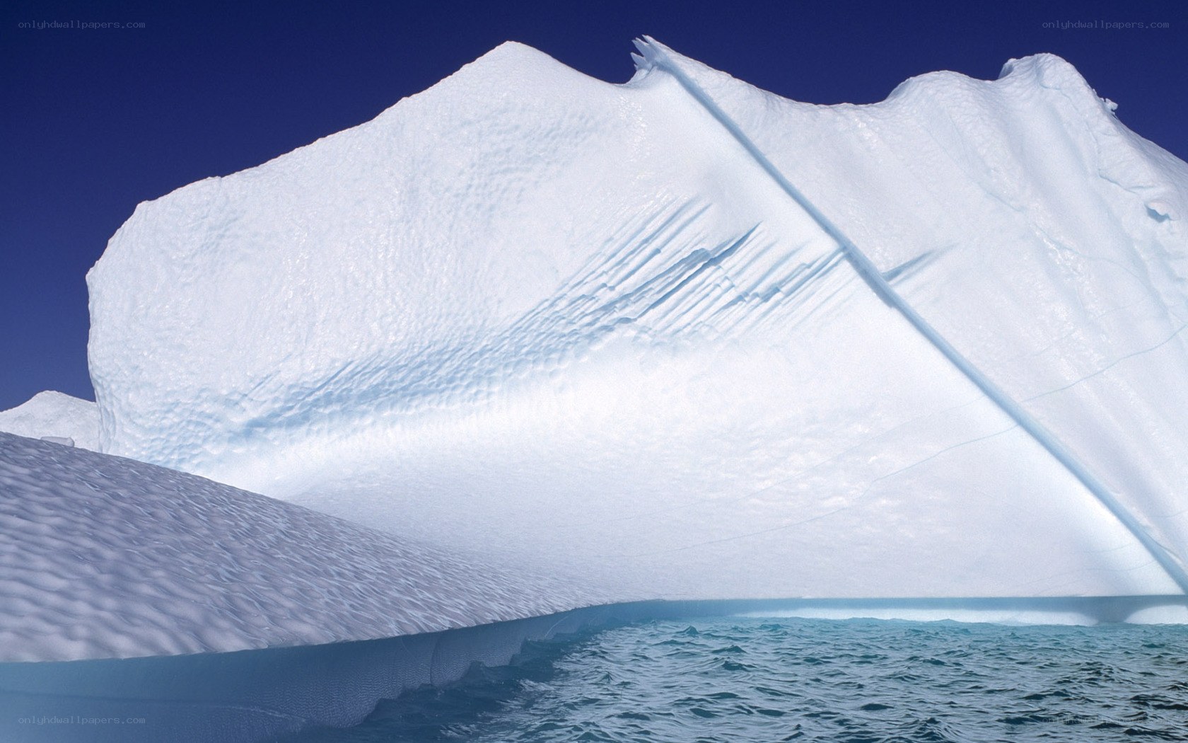 Large iceberg floating in ocean