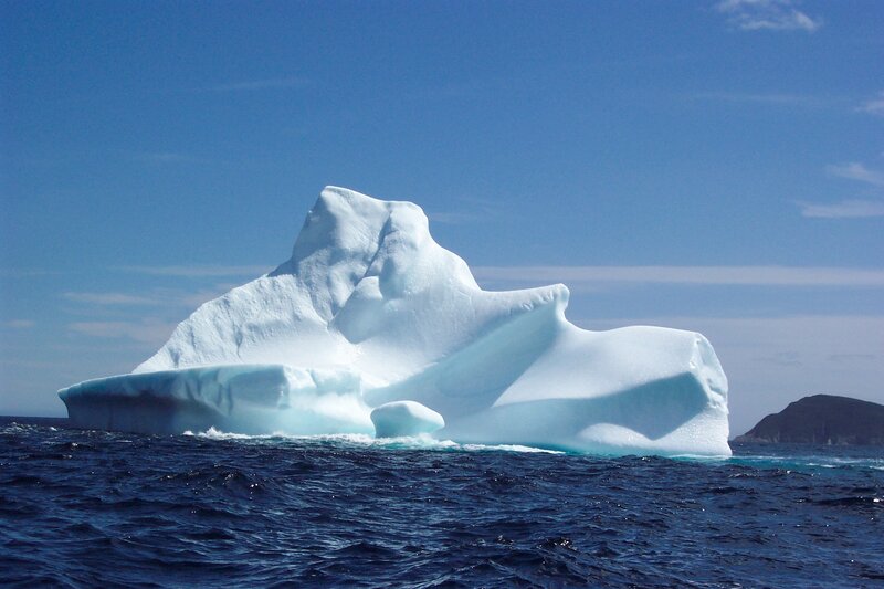Large iceberg floating in ocean