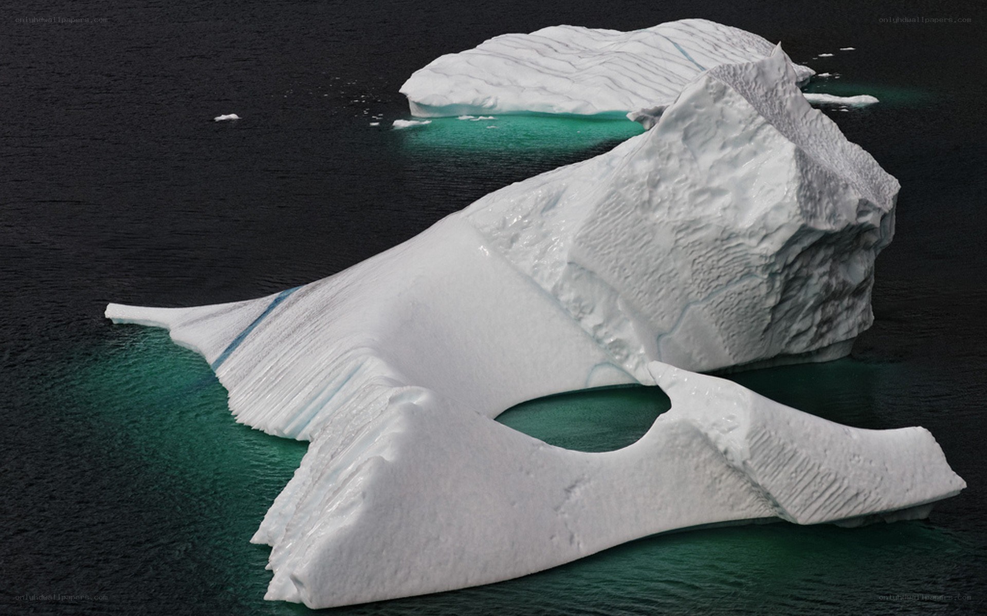 Large iceberg floating in ocean