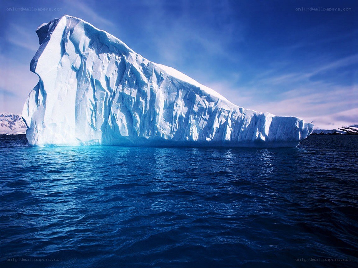 Large iceberg floating in ocean