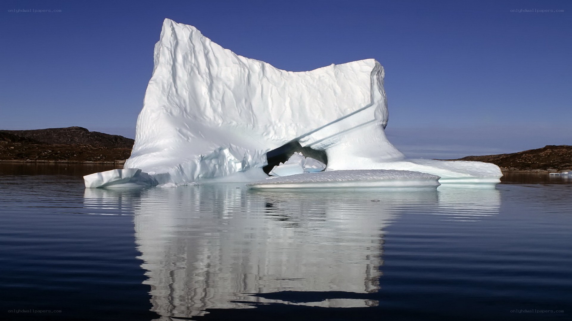 Large iceberg in calm water