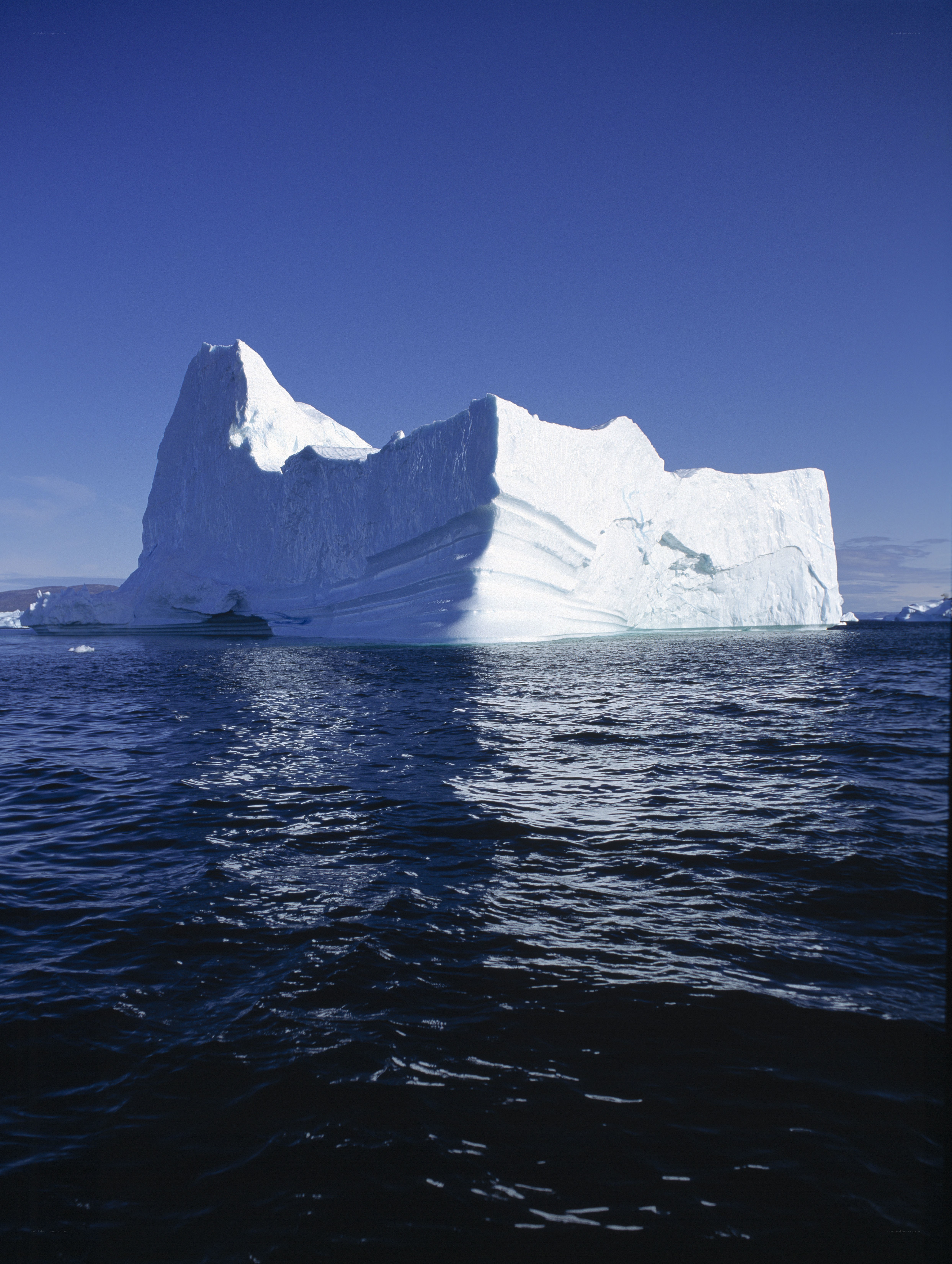 Large iceberg in calm waters