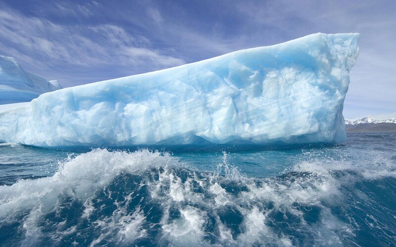 Large Iceberg in Ocean — Blue, Dramatic, Afternoon