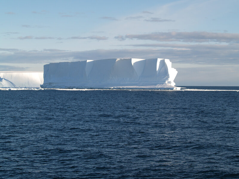 Large Iceberg in Ocean — Blue, Serene, Afternoon