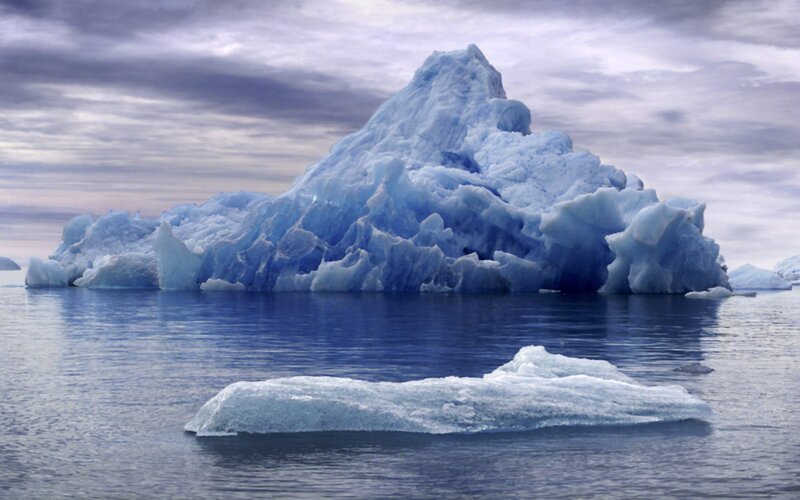 Large Iceberg in Ocean — Blue, Serene, Photograph, Sky, Ice, White