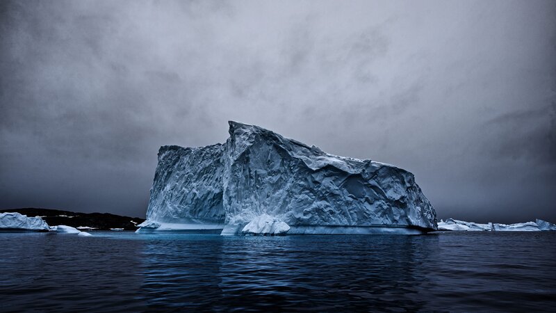 Large Iceberg in Water — Blue, Dramatic, Photograph