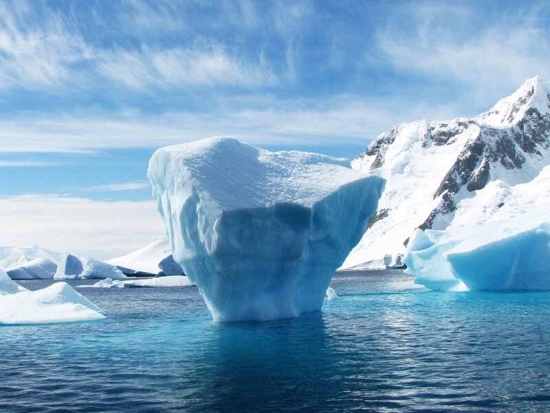 Large Iceberg in Water — Blue, Serene, Afternoon, Photograph, Mountain
