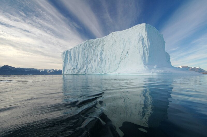 Large Iceberg in Water — Blue, Serene, Afternoon, Photograph, Mountains