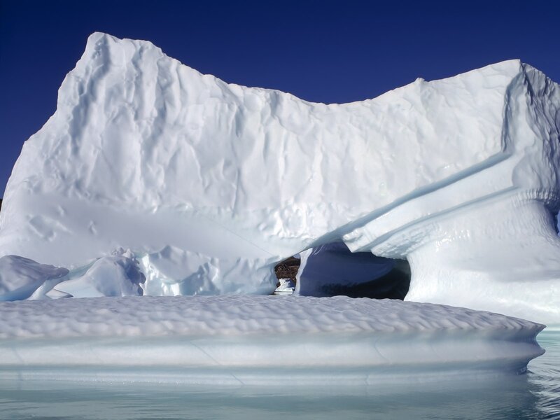 Large iceberg with arch