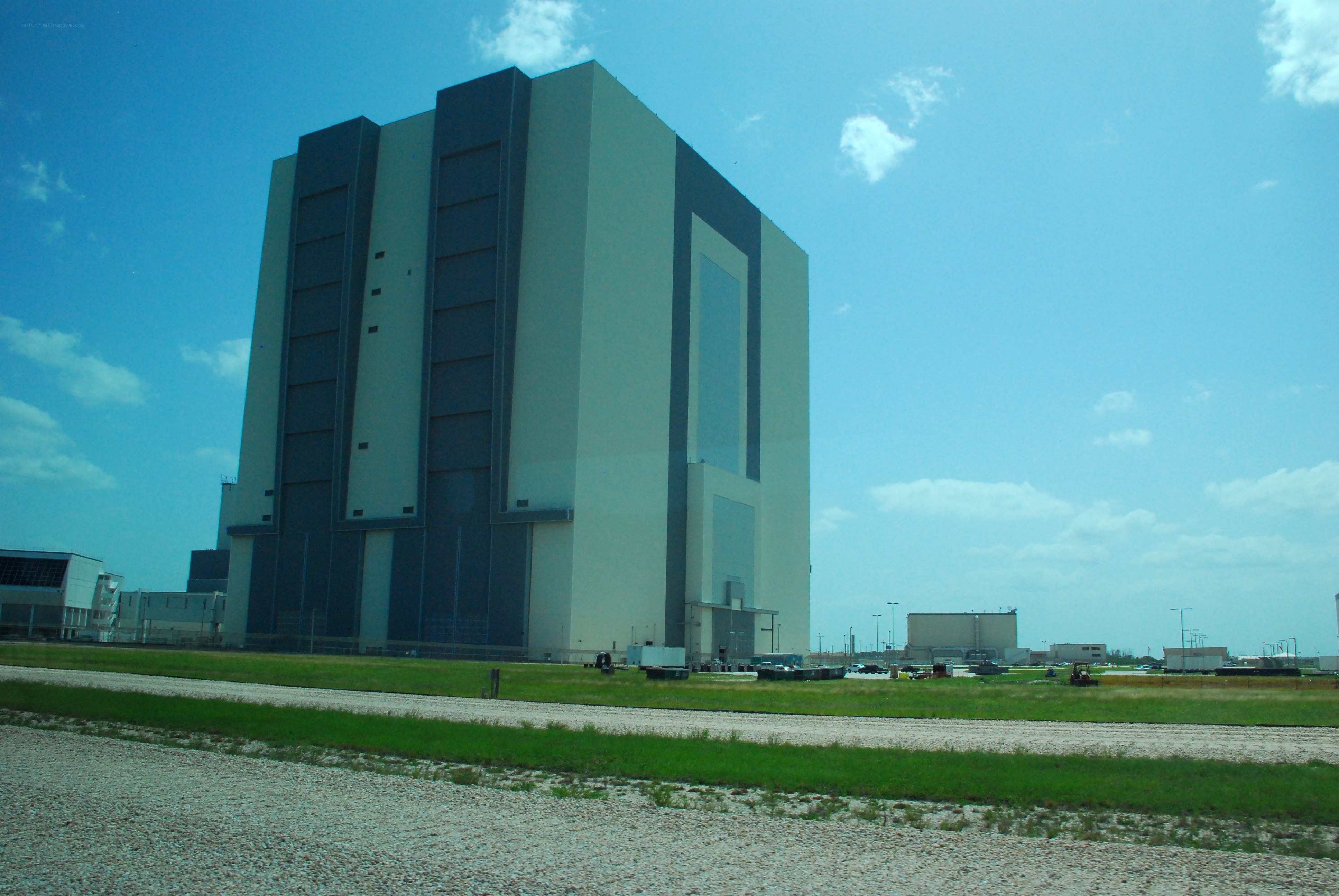 large industrial building under blue sky