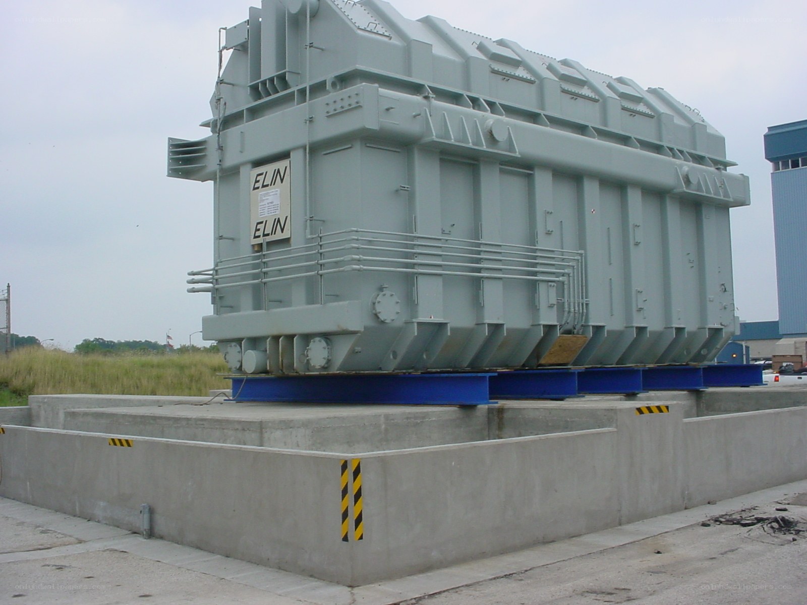 Large industrial transformer on concrete pad
