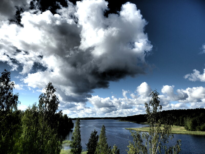 Large Lake under Cloudy Sky