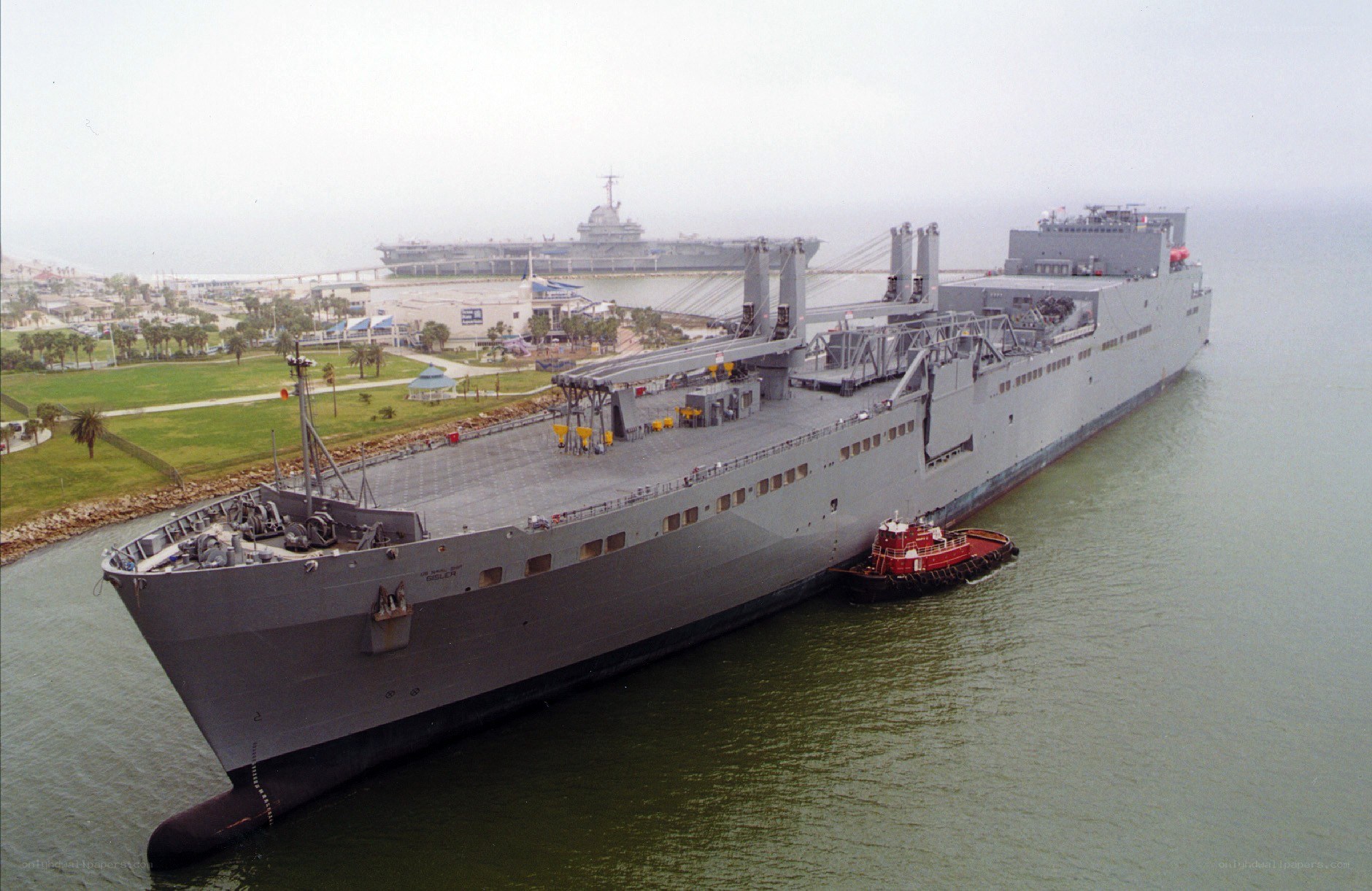 Large military ship at port