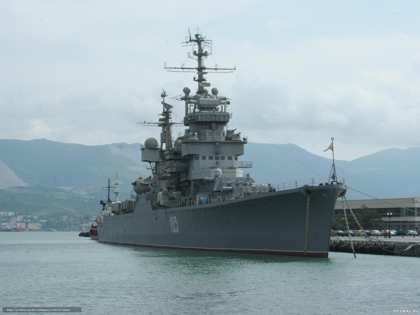 Large military ship in harbor